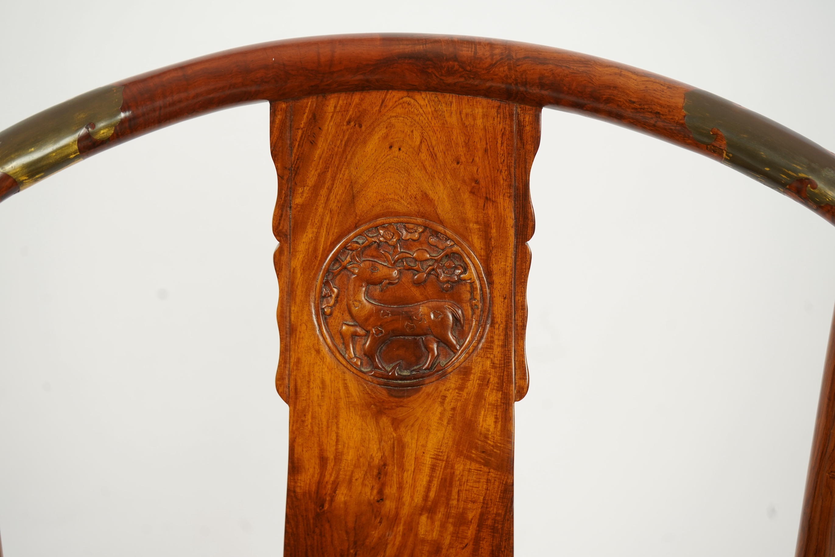 A pair of Chinese huanghuali and brass mounted horseshoe-back armchairs, quanyi, 19th century